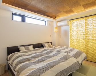 Family Inn Kei - Kyōto - Schlafzimmer
