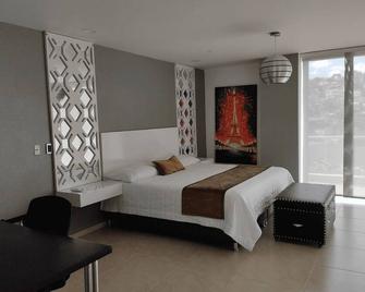 Hotel Andinos Plaza Florencia - Florencia - Habitación