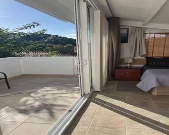 T2 climatisé + parking 500 m plage/centre ville - Lloret de Mar - Balcón