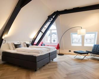 Snoozz Hotels - Boalsert - Schlafzimmer