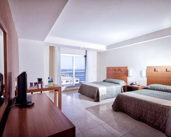 Balaju Hotel & Suites - ורה קרוז - חדר שינה