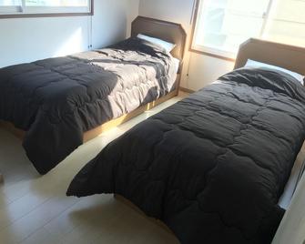 Sapporo Guest House Anne - Hostel - Sapporo - Bedroom