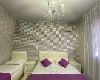 Liart Hotel - Vityazevo - Schlafzimmer