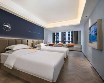 Ease Hotel · Zhi (Yichang Three Gorges Visitor Center Binjiang Wanda) - Yichang - Schlafzimmer
