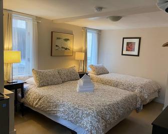 Douglas Guest House - ונקובר - חדר שינה