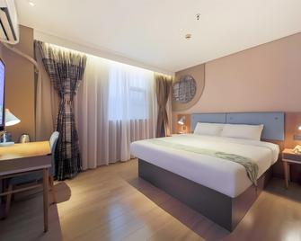 Home Inn Neo Heyuan Railway Station - Heyuan - Schlafzimmer