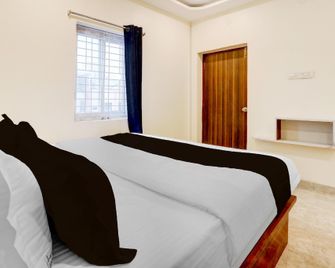 Hotel O Rainbow - Warangal - Bedroom