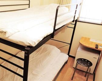 هوتل لاكي - أوساكا - غرفة نوم