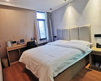 Greentree Hotel (Nanjing Xuanwu Lake Shiziqiao Pedestrian Street) - Nankín - Habitación