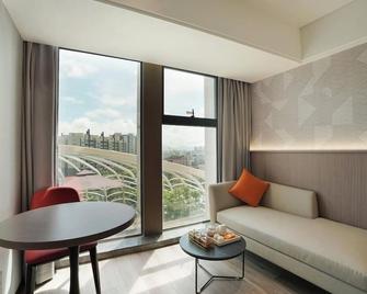 Borrman Hotel Yangjiang Baili Square - Yangjiang - Вітальня