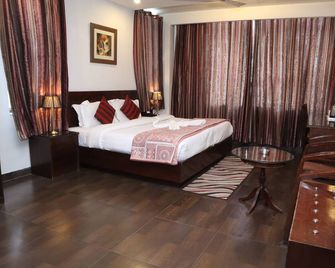 Hotel Hari Heritage - Haridwar - Phòng ngủ