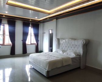 Penginapan Nurmega jaya - Sukabumi - Slaapkamer