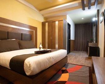 Collection O Thondayad Calicut Dream Casa - Kozhikode - Chambre