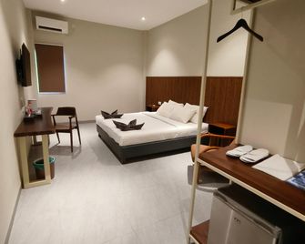 Panda Hotel Merauke - Merauke - Bedroom