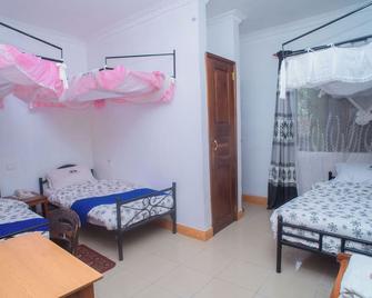 Arusha Giraffe Lodge - Arusha - Bedroom