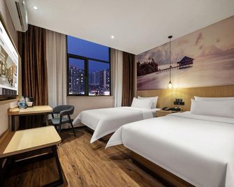 Jiaozuo Century Star Hotel (Jianshe Road Jiaozuo Station) - Jiaozuo - Slaapkamer