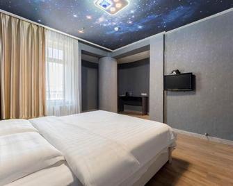 Xinsanqi Hotel - Siping - Bedroom