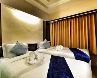 Excella Hotel - Ubon Ratchathani - Bedroom