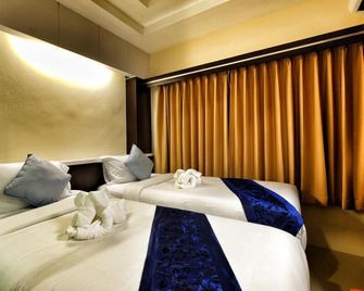 Excella Hotel - Ubon Ratchathani - Habitación