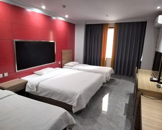 Juxinyuan Business Hotel - Turpan - Bedroom