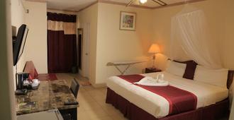 Executive Airport Hotel - Entebbe - Bedroom