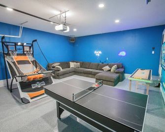 Spacious Retreat with Dual Master Suites, Game Room and Outdoor Escape - Ankeny - Living room