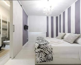 Resilienza Tropical Apartments & Room - Porto Sant'Elpidio - Camera da letto