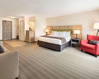 Country Inn & Suites by Radisson, Chippewa Falls, WI - Chippewa Falls - Bedroom