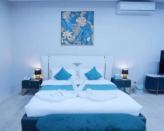 Relax Palace Hotel Apartments - Abha - Schlafzimmer