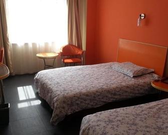 Motel 168 Hotel - Ürümqi - Habitación