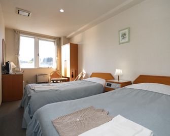 Hotel Tensui Misawa - Misawa - Camera da letto