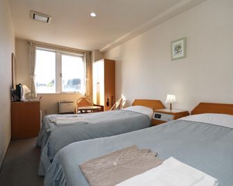 Hotel Tensui - Misawa - Camera da letto