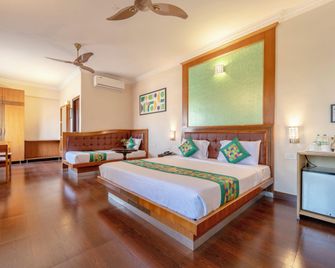 Treebo Akshaya Palace Inn - Mysore - Bedroom