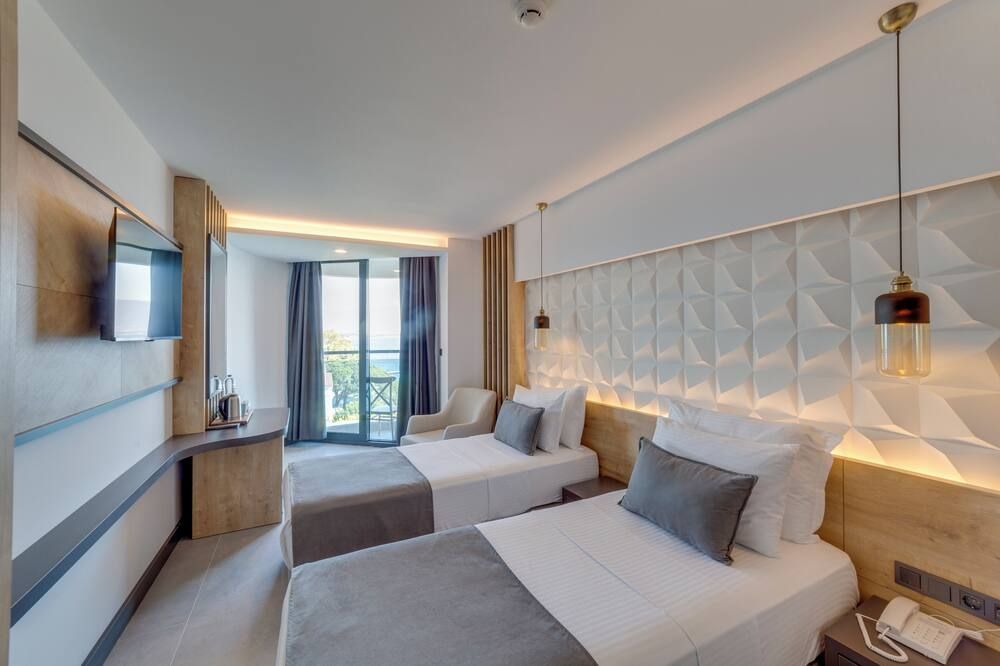 Signature Blue Resort - קושאדסי - חדר שינה