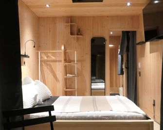 Cozy new cabin in Tofino, blend of luxury and nature. Close to beaches and town - Tofino - Bedroom