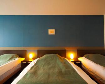 Hotel Aile - Beppu - Schlafzimmer