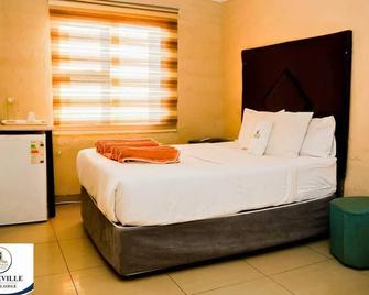 Princeville Guest Lodge - Soweto - Slaapkamer
