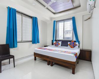 Fabexpress Galaxy Apartments - Pune - Bedroom