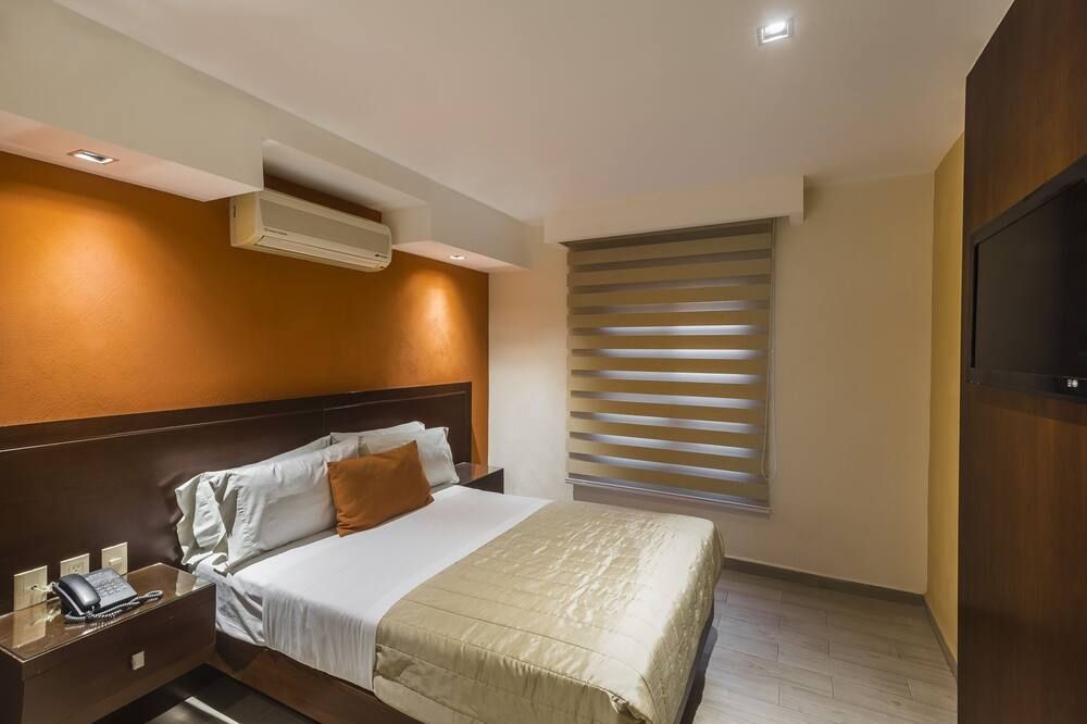 Hotel Puerta del Sol - גוואדאלחארה - חדר שינה