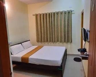Comforts Hostel - Mysuru - Schlafzimmer