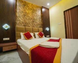 Kashi Pilgrim Stay - Varanasi - Κρεβατοκάμαρα