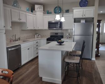 Centrally located between Omaha and Lincoln in a quiet community. - Louisville - Kitchen