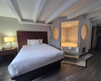 Country Inn & Suites by Radisson Battle Creek, MI - Battle Creek - Makuuhuone