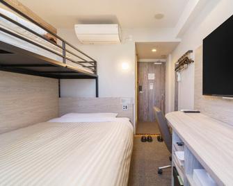 Super Hotel Kushiro Kurogane - Kushiro - Makuuhuone