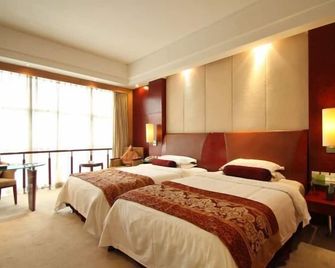 Xin Ci Hotel - Yancheng - Bedroom