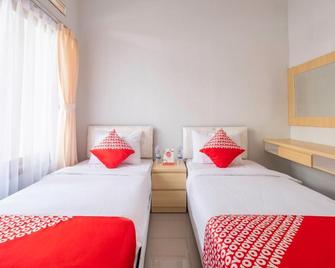 OYO 1271 One Family Guesthouse - Lembang - Slaapkamer