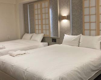 Nonsmoking Deluxe Twin 2 people Room only / Okawa Fukuoka - Okawa - Slaapkamer