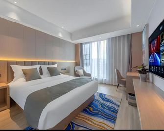 Gya Hotel Kunming Zijin Center Xiaodongcun Metro Station - Kunming - Schlafzimmer