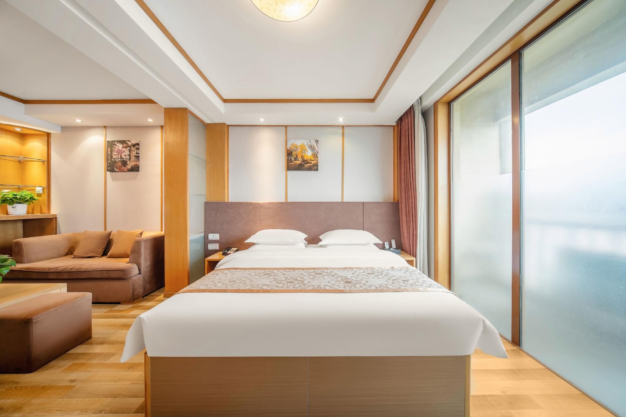 Qingdao Hanyuan Century Hotel - تشينغداو - غرفة نوم