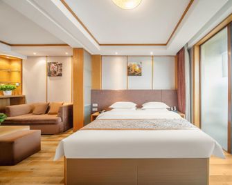 Qingdao Hanyuan Century Hotel - Qingdao - Yatak Odası